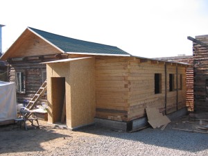 Outside view of addition including covered entry way. 